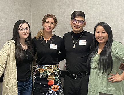 Group of people posing together during an event